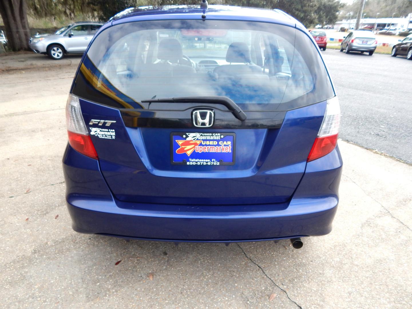 2012 Blue /Gray Honda Fit (JHMGE8H39CC) with an 4 cyl. engine, Automatic transmission, located at 3120 W Tennessee St, Tallahassee, FL, 32304-1002, (850) 575-6702, 30.458841, -84.349648 - Photo#3